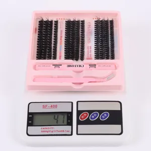 DIY eyelash extension kit featuring 216 clusters with tweezers and dual bond seal glue