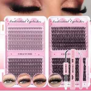 Macro detail of individual lash clusters set with bond seal glue and pink tweezers