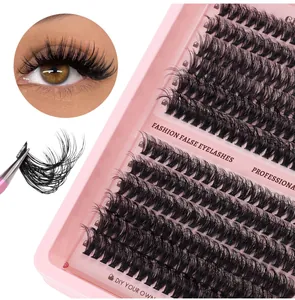 Detail of DIY cluster lash kit with black synthetic fibers and professional tweezers
