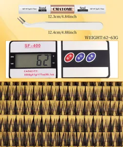Eyelash extension kit with glue, tweezers, and segmented fairy lashes on a scale