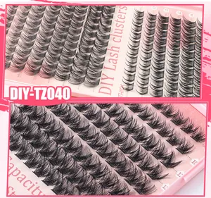 Detailed view of DIY lash clusters kit with mixed lengths 10-16mm on a pink tray