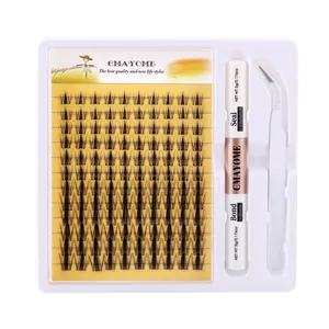 Professional DIY eyelash extension kit including black lash clusters, glue, and tweezers
