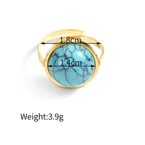Detail view of gold adjustable ring with 1.4cm turquoise stone and 3.9g weight