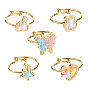 5-piece gold adjustable ring set with resin bunny, bear, butterfly, star and flower motifs