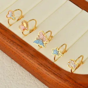 Set of 5 colorful butterfly and heart rings in gold metal with adjustable bands
