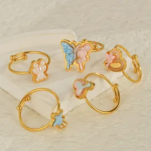 5-piece gold adjustable ring set with colorful butterfly, bear paw and star charms