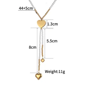 Détails du collier cœur en perles dorées avec pompon en Y et dimensions de l'article