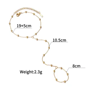 Detailed view of gold slave chain with beaded links and dimension callouts