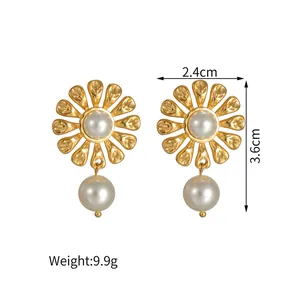 Elegant gold titanium sunflower earrings with white pearls and detailed size dimensions