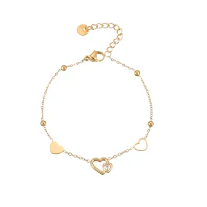 Elegant 18K gold plated stainless steel bracelet featuring zircon heart pendants and beads