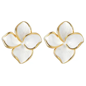Minimalist stainless steel flower stud earrings with white enamel and golden edges
