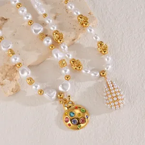 Elegant pearl sweater chain with gold butterfly pendant and colorful crystal ladybug