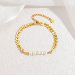 Elegant 18k gold wheat leaf bracelet with five white pearls and adjustable lobster clasp