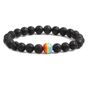 Chakra Lava Stone Bracelet with Rainbow Pride Bead on white background