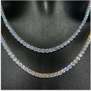 Elegant gold and silver tennis necklaces with round cubic zirconia on a black neck bust