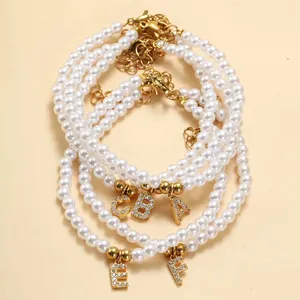Elegante parelarmband 3-4mm met verstelbare gouden ketting en kristallen letters