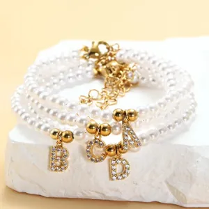 Elegante 3-4mm parelarmbanden set met gouden sluiting en fonkelende alfabet letterhangers