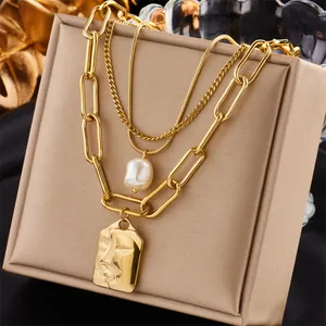 Layered 18K gold titanium steel necklace with portrait coin and pearl pendants