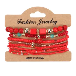 Bohemian multi-layer handmade beaded bracelet set in vibrant red with gold accents