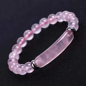 Pink rose quartz beaded bracelet with central rectangular stone and silver spacers