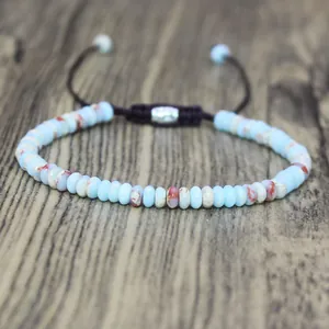 Handgemaakte natuursteen kralenarmband met blauwe agaat en verstelbaar gewaxt trekkoord