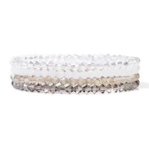 Bohemian crystal beaded bracelet set featuring four stacked tiers in iridescent colors