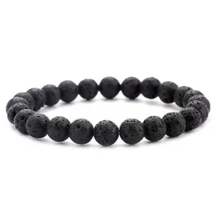 Detailed macro view showing the porous texture of 8mm natural black lava stone beads