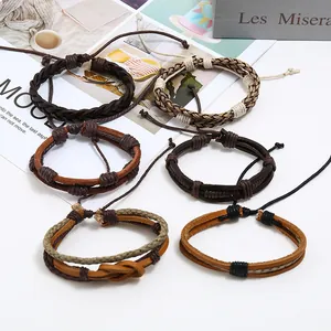 Macro shot of 6-piece vintage braided leather bracelets featuring cord and knot textures