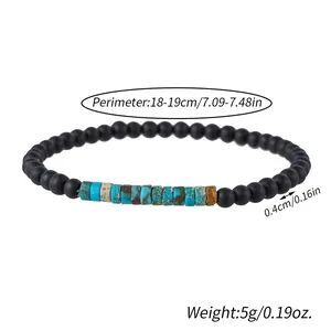 Detail shot of a beaded bracelet with 0.4cm matte black and marbled stone beads