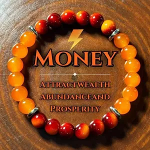 Tiger eye beaded wealth bracelet with silver spacers on a natural wood background