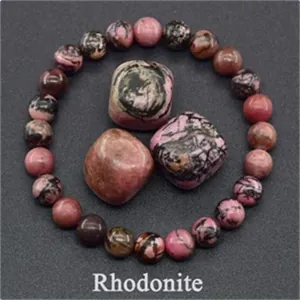 Natural rhodonite stone beaded bracelet with pink and black manganese mineral texture