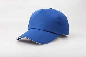 Detailed view of heavy cotton blue baseball cap with five-panel design and white brim edge