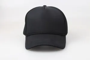 Detail shot of a black foam trucker hat with braided rope detail on a white background