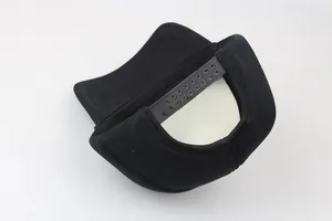 Detail view of the adjustable snapback closure and interior of a black foam trucker hat