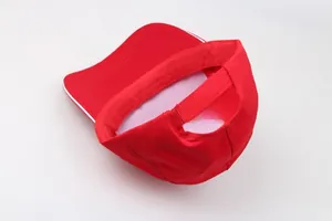 Detail of red cotton baseball cap interior showing white lining and adjustable strap
