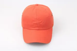 Detail of breathable orange safety baseball cap with reinforced stitching and eyelets