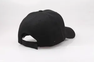 Detail view of adjustable velcro closure on black thickened baseball cap with neat stitching