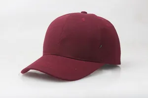 Detail view of burgundy baseball cap in thick twill cotton with six-panel construction