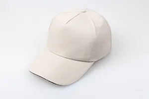 Detailed close-up of beige twill cotton baseball cap with four-row brim stitching details