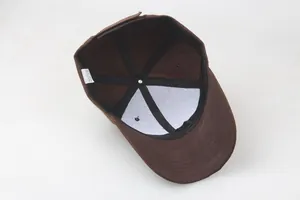 Detail view of cotton twill baseball cap interior with stitching and washing label