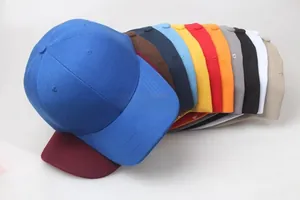 Detailed fan-shaped arrangement of solid color thick cotton baseball caps in various vibrant tones