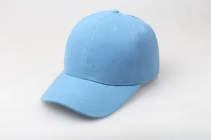 Detailed close-up of light blue cotton twill baseball cap showing reinforced brim stitching