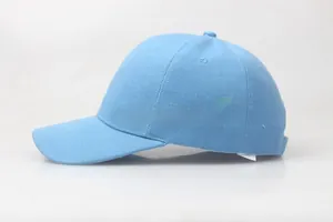 Close-up of light blue cotton baseball cap showing twill texture and sturdy brim detail