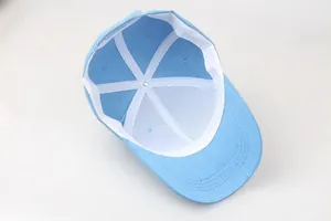 Detailed interior of light blue cotton baseball cap showing white sweatband and reinforcing tape