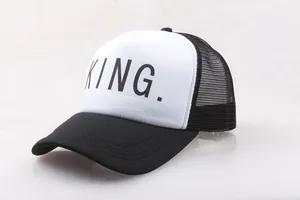 Detail of a black and white trucker hat with King letter print and breathable mesh back