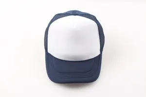 Detail view of a two-tone mesh trucker hat with a white front panel and navy blue visor