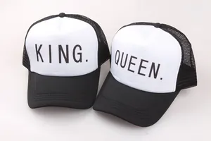 Detail of King and Queen couple trucker hats with breathable mesh and sharp stitching