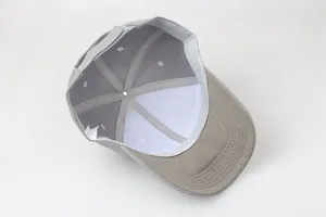 Interior detail of a gray baseball cap showing breathable cotton lining and sweatband