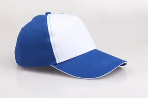 Side view of two-tone cotton twill baseball cap with blue panels and white front