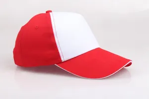 Detail shot of red and white twill cotton baseball cap with white contrast sandwich brim